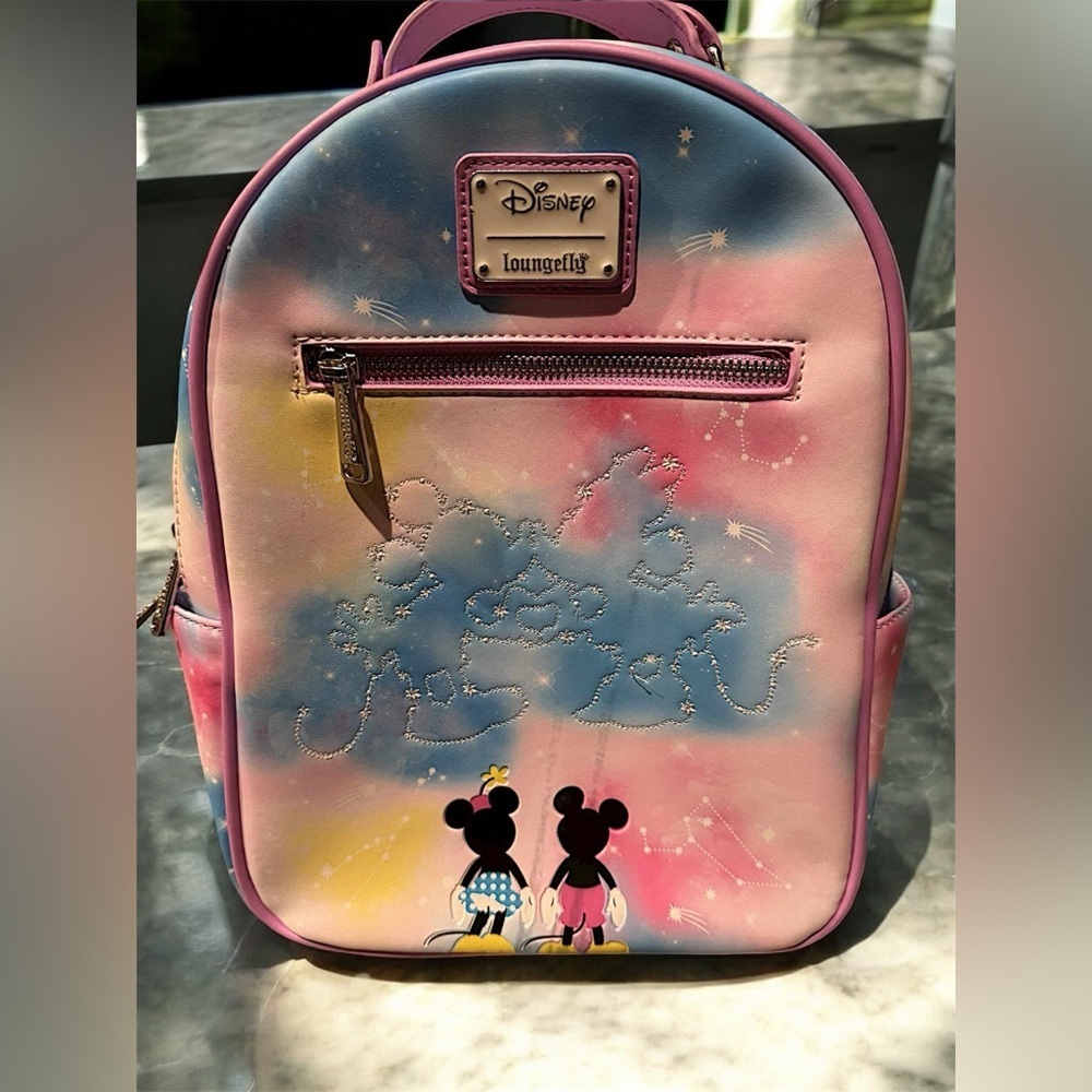 Loungefly Disney Mickey Mouse Pastel Sky Backpack** 2 light scuffs on the front.